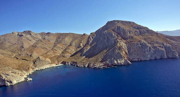 Limenari bay anchorage on Tilos island - Sailing yacht at anchor.