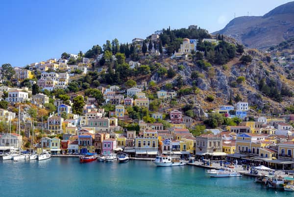 Sailing vacations Symi port in Greece.